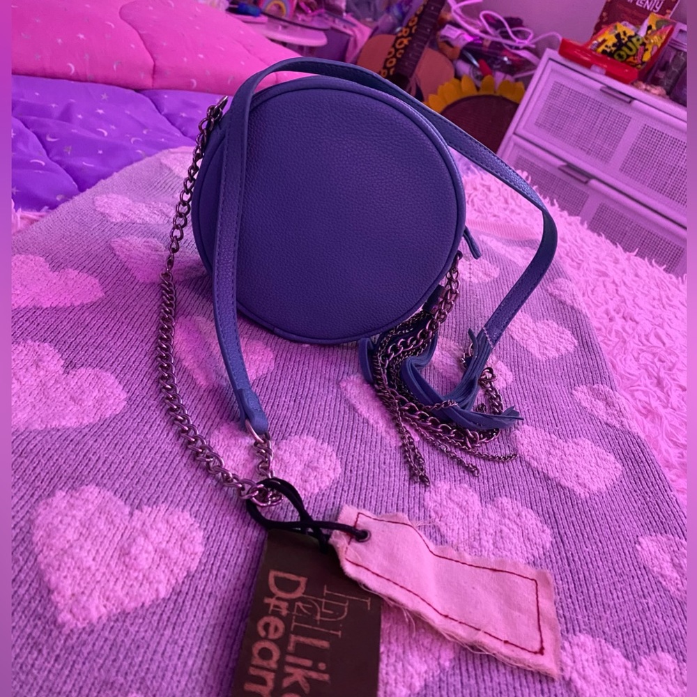 Blue circular crossbody purse